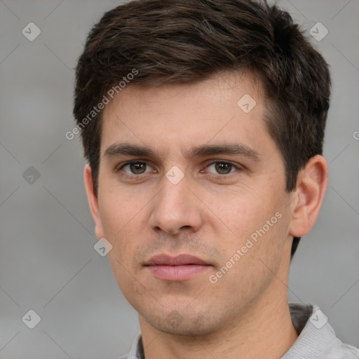 Neutral white young-adult male with short  brown hair and grey eyes