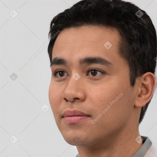 Neutral asian young-adult male with short  black hair and brown eyes