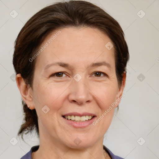 Joyful white adult female with short  brown hair and brown eyes