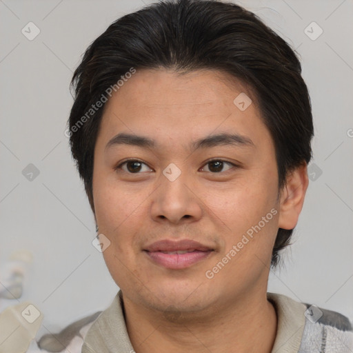 Joyful asian young-adult female with short  brown hair and brown eyes