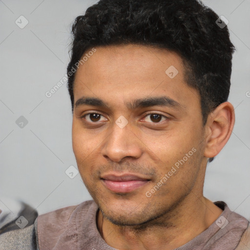 Neutral latino young-adult male with short  black hair and brown eyes