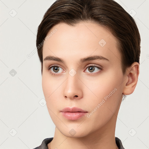 Neutral white young-adult female with short  brown hair and brown eyes