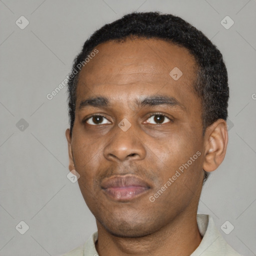 Neutral black young-adult male with short  black hair and brown eyes