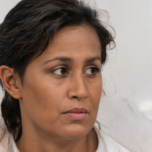 Neutral white adult female with medium  brown hair and brown eyes