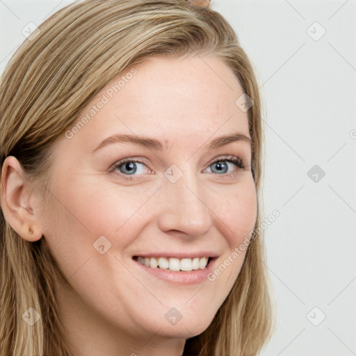 Joyful white young-adult female with long  brown hair and blue eyes