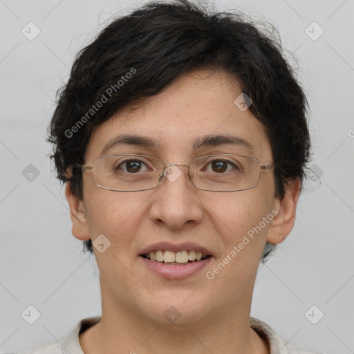 Joyful white adult female with short  brown hair and brown eyes