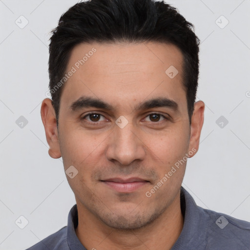 Joyful white young-adult male with short  black hair and brown eyes