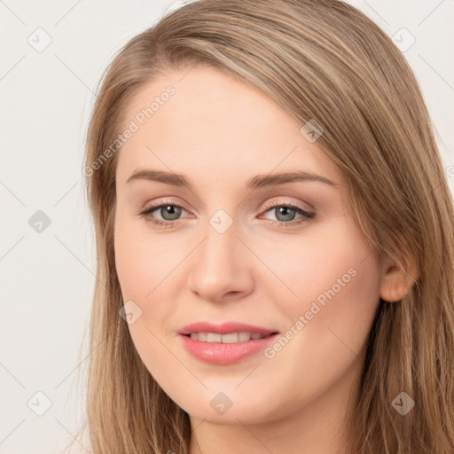 Joyful white young-adult female with long  brown hair and grey eyes