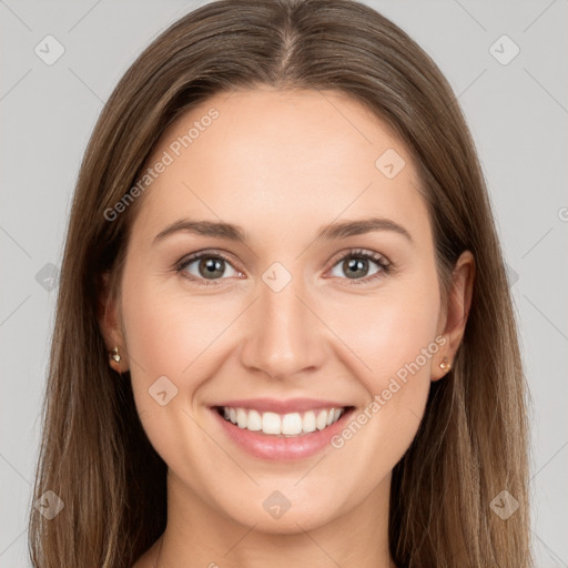 Joyful white young-adult female with long  brown hair and grey eyes