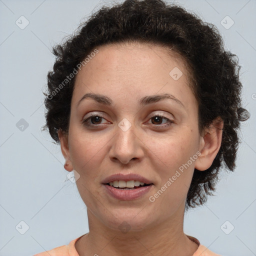 Joyful white adult female with short  brown hair and brown eyes