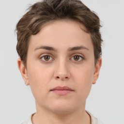 Neutral white young-adult female with short  brown hair and brown eyes