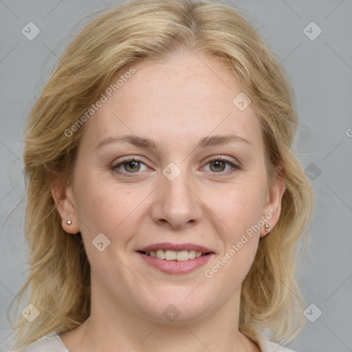 Joyful white young-adult female with medium  brown hair and blue eyes