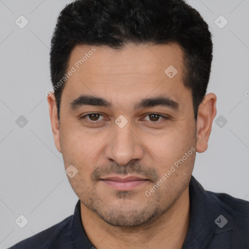 Joyful white young-adult male with short  black hair and brown eyes