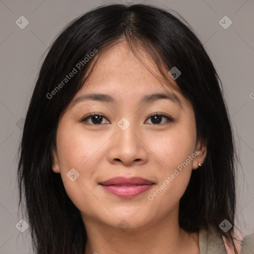 Joyful asian young-adult female with medium  brown hair and brown eyes