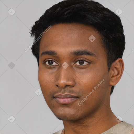 Neutral latino young-adult male with short  black hair and brown eyes