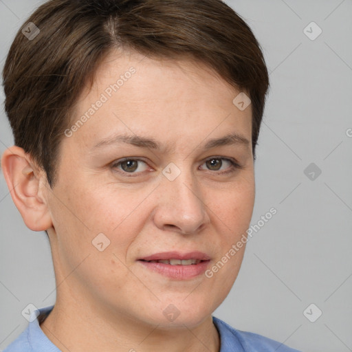 Joyful white adult female with short  brown hair and brown eyes