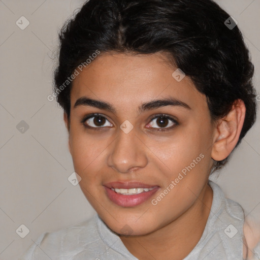 Joyful latino young-adult female with short  brown hair and brown eyes