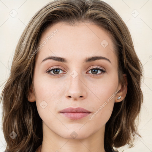 Joyful white young-adult female with long  brown hair and green eyes