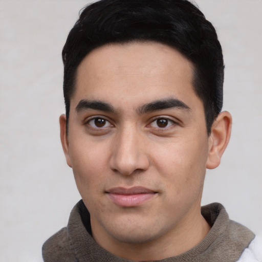Neutral latino young-adult male with short  black hair and brown eyes