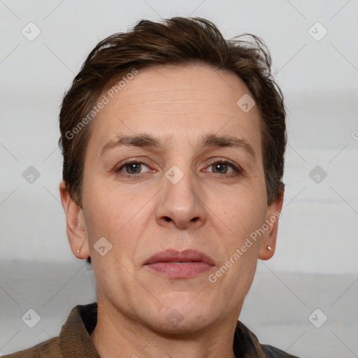 Joyful white adult female with short  brown hair and brown eyes