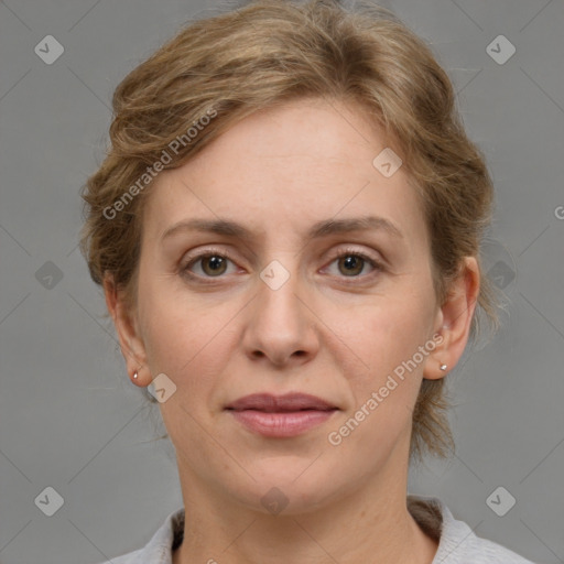 Joyful white adult female with medium  brown hair and grey eyes