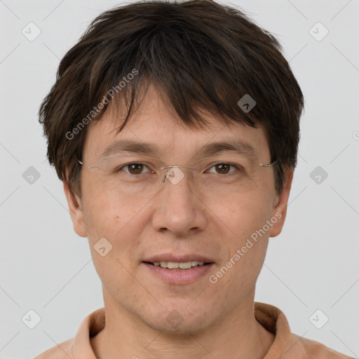 Joyful white adult male with short  brown hair and grey eyes