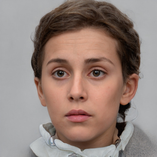 Neutral white young-adult female with short  brown hair and grey eyes