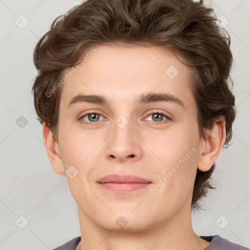 Joyful white young-adult male with medium  brown hair and brown eyes