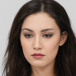 Neutral asian young-adult female with long  brown hair and brown eyes