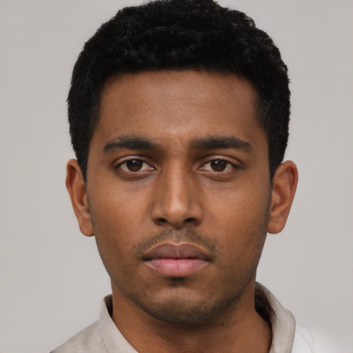 Neutral black young-adult male with short  black hair and brown eyes