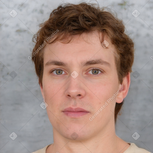 Neutral white young-adult male with short  brown hair and grey eyes