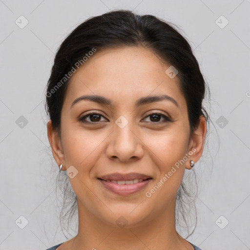 Joyful latino young-adult female with long  brown hair and brown eyes