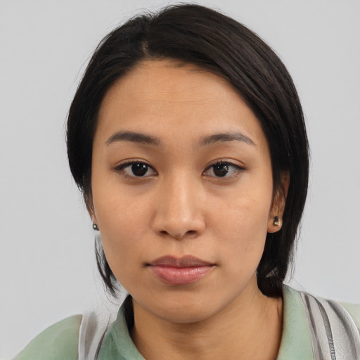 Neutral asian young-adult female with medium  black hair and brown eyes