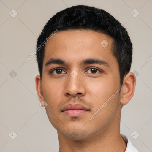 Neutral latino young-adult male with short  black hair and brown eyes