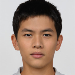 Neutral asian young-adult male with short  brown hair and brown eyes