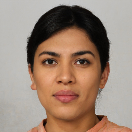 Neutral latino young-adult female with short  black hair and brown eyes