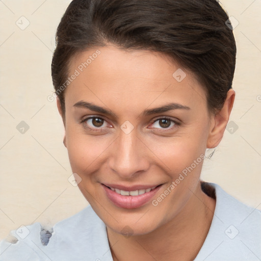 Joyful white young-adult female with short  brown hair and brown eyes