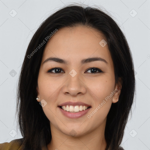 Joyful asian young-adult female with long  brown hair and brown eyes