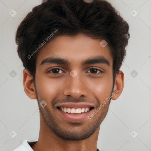 Joyful latino young-adult male with short  brown hair and brown eyes