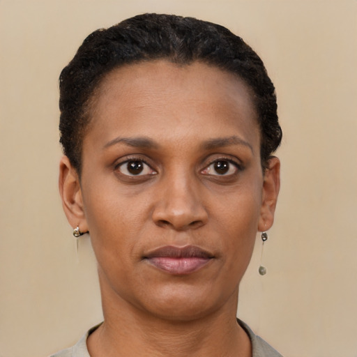 Neutral black young-adult female with short  black hair and brown eyes