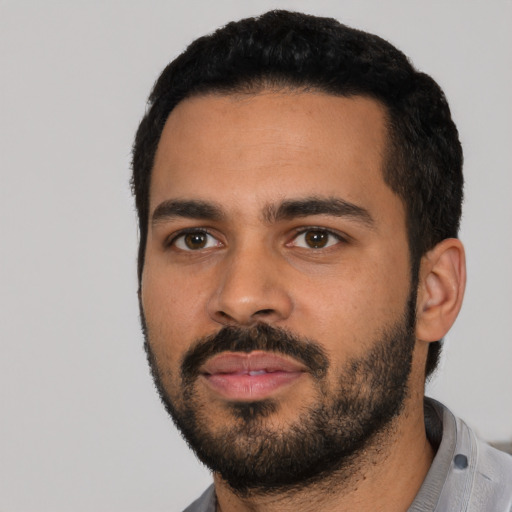 Neutral latino young-adult male with short  black hair and brown eyes