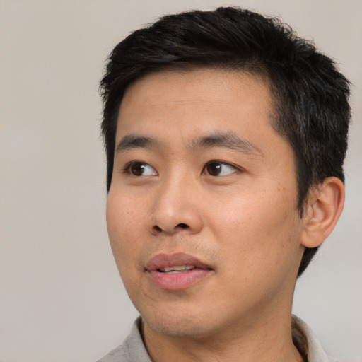 Neutral asian young-adult male with short  black hair and brown eyes