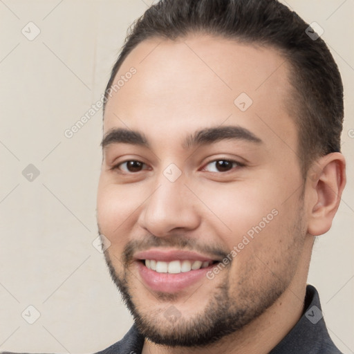 Joyful white young-adult male with short  brown hair and brown eyes