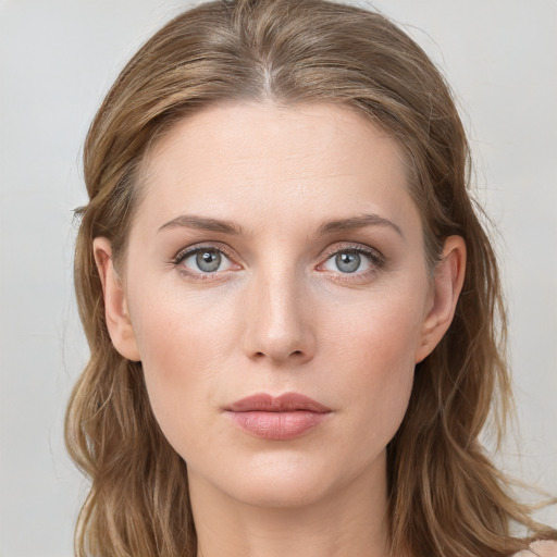 Neutral white young-adult female with medium  brown hair and blue eyes