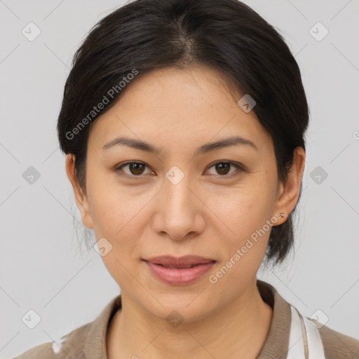 Joyful asian young-adult female with medium  brown hair and brown eyes