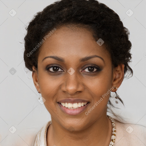 Joyful black young-adult female with long  brown hair and brown eyes