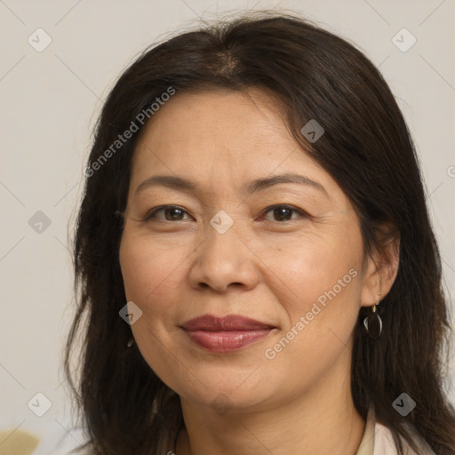 Joyful white adult female with medium  brown hair and brown eyes