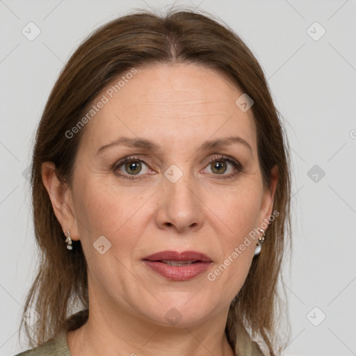 Joyful white adult female with medium  brown hair and grey eyes