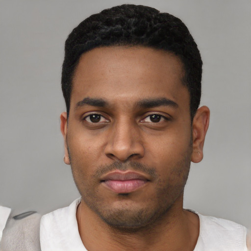 Neutral black young-adult male with short  black hair and brown eyes