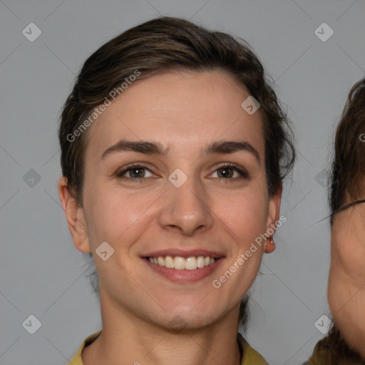 Joyful white young-adult female with medium  brown hair and brown eyes